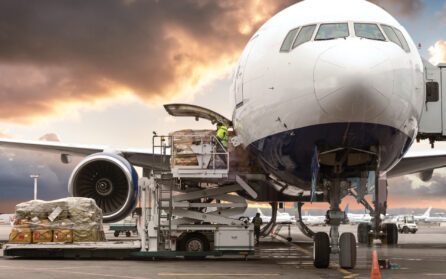 Air freight cargo being loaded into an airplane